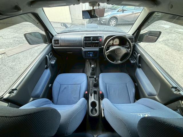 ジムニー FISフリースタイルワールドカップリミテッド 禁煙車・シートヒーター・スキッドガードバンパーアルミ縞板製・ETC・LEDヘッドライト・サイドバイザー・アルミホイール16インチ・カロッツェリアUSBオーディオ・トランスファーレバー(3枚目)