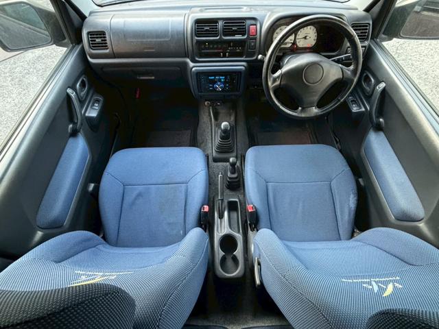 ジムニー FISフリースタイルワールドカップリミテッド 禁煙車・シートヒーター・スキッドガードバンパーアルミ縞板製・ETC・LEDヘッドライト・サイドバイザー・アルミホイール16インチ・カロッツェリアUSBオーディオ・トランスファーレバー(4枚目)