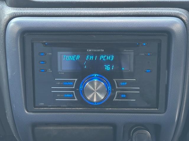 ジムニー FISフリースタイルワールドカップリミテッド 禁煙車・シートヒーター・スキッドガードバンパーアルミ縞板製・ETC・LEDヘッドライト・サイドバイザー・アルミホイール16インチ・カロッツェリアUSBオーディオ・トランスファーレバー(8枚目)