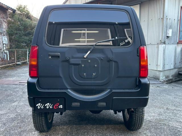 ジムニー FISフリースタイルワールドカップリミテッド 禁煙車・シートヒーター・スキッドガードバンパーアルミ縞板製・ETC・LEDヘッドライト・サイドバイザー・アルミホイール16インチ・カロッツェリアUSBオーディオ・トランスファーレバー(29枚目)