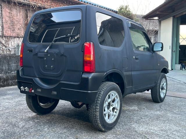 ジムニー FISフリースタイルワールドカップリミテッド 禁煙車・シートヒーター・スキッドガードバンパーアルミ縞板製・ETC・LEDヘッドライト・サイドバイザー・アルミホイール16インチ・カロッツェリアUSBオーディオ・トランスファーレバー(30枚目)