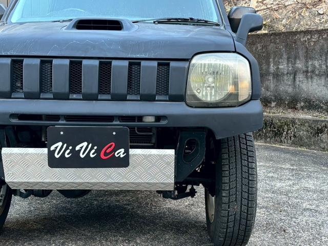 ジムニー FISフリースタイルワールドカップリミテッド 禁煙車・シートヒーター・スキッドガードバンパーアルミ縞板製・ETC・LEDヘッドライト・サイドバイザー・アルミホイール16インチ・カロッツェリアUSBオーディオ・トランスファーレバー(62枚目)