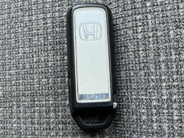 N-BOX G・Lホンダセンシング HondaSENSING リア左右パワースライドドア 2トーン塗装 前席用i-サイドエアバッグ+サイドカーテンエアバッグシステム(前席/後席対応) LEDヘッドラ(30枚目)