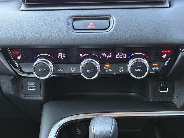 ヴェゼル ｅ：ＨＥＶＺ　ブラインドスポットインフォメーション　	ハンズフリーアクセスパワーテールゲート（予約クローズ機能付）　	親水／ヒーテッドドアミラー＋熱線入りフロントウインドウ＋前席シートヒータ（24枚目）