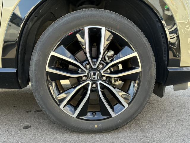 ヴェゼル ｅ：ＨＥＶＺ　ブラインドスポットインフォメーション　	ハンズフリーアクセスパワーテールゲート（予約クローズ機能付）　	親水／ヒーテッドドアミラー＋熱線入りフロントウインドウ＋前席シートヒータ（49枚目）