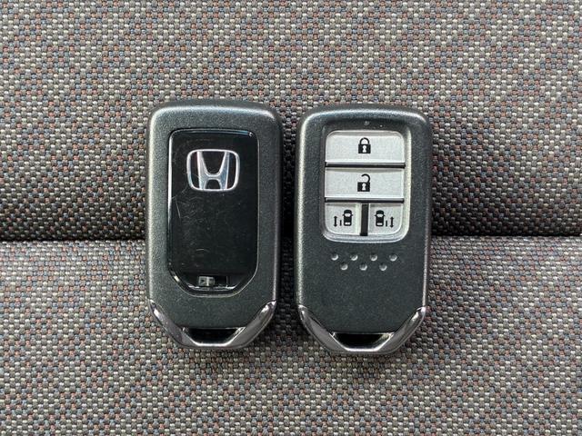 フリード Ｇ・ホンダセンシング　リア両側パワースライドドア　センターテーブル　オートリトラミラー　	Ｃパッケージ　ＥＴＣ車載器（ナビ連動）　運転席＋助手席シートヒーター　ロールサンシェード（28枚目）