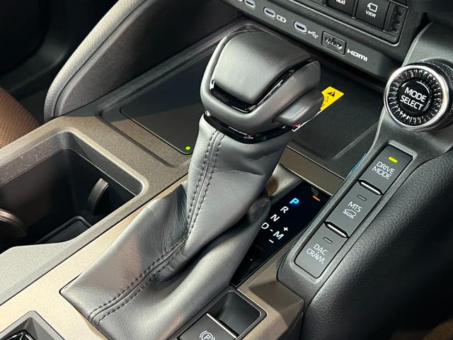 ランドクルーザー250 ZXファーストエディション 【ファーストエディション】 内装ブラウン 丸目ヘッドライト 12.3インチJBLコネクトナビ チームメイト  デジタルインナーミラー サンルーフ 電動デフロック 置き充電 シートメモリー 純正18AW(64枚目)