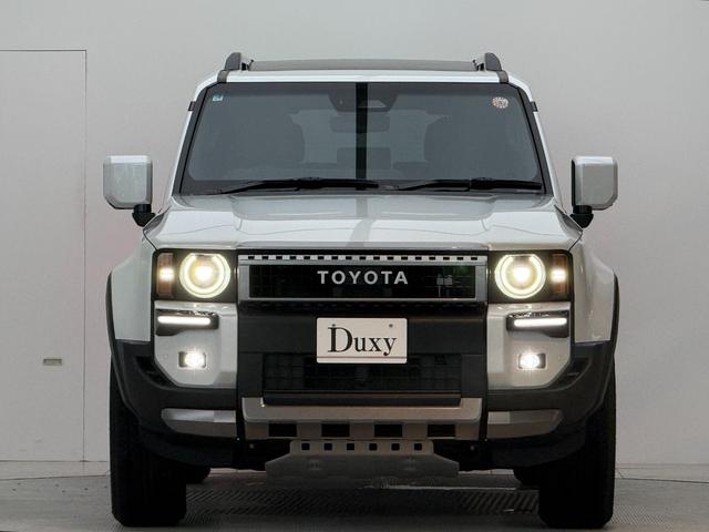 ランドクルーザー250 VX 【丸目ヘッドライト付】 内装ブラック モデリスタエアロ シグネチャーイルミブレード トヨタチームメイト デジタルミラー パノラミックビューモニター ブラインドスポットモニター サンルーフ 純正16AW(4枚目)