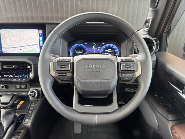 ランドクルーザー２５０ ＺＸファーストエディション　【ファーストエディション！】　内装ブラウン　丸目ヘッドライト　１２．３インチＪＢＬコネクトナビ　チームメイト　デジタルインナーミラー　サンルーフ　ヒッチメンバー　置き充電　シートメモリー　純正１８ＡＷ（49枚目）