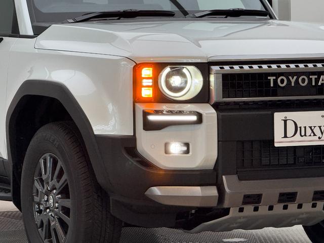 ランドクルーザー２５０ ＶＸ　【丸目ヘッドライト付】　内装ブラック　モデリスタエアロ　シグネチャーイルミブレード　トヨタチームメイト　デジタルミラー　パノラミックビューモニター　ブラインドスポットモニター　サンルーフ　純正１６ＡＷ（18枚目）