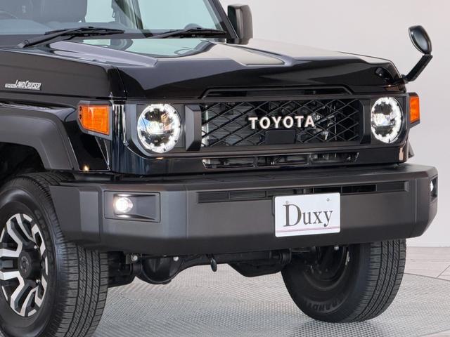 ランドクルーザー７０ ＡＸ　【純正ナビ付き】　丸目ヘッドライト　バックモニター内臓インナーミラー　電動デフロック　　背面タイヤ　リモコンキー　　ヒルスタートアシストコントロール　ダウンヒルスタートコントロール　純正１６インチＡＷ（23枚目）