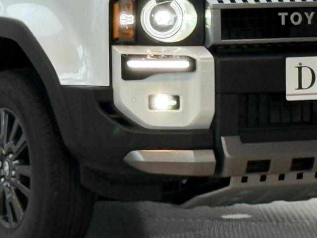 ランドクルーザー250 VX 【丸目ヘッドライト付】 内装ブラック モデリスタエアロ シグネチャーイルミブレード トヨタチームメイト デジタルミラー パノラミックビューモニター ブラインドスポットモニター サンルーフ 純正16AW(19枚目)