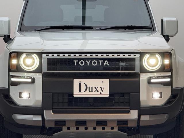 ランドクルーザー250 VX 【丸目ヘッドライト付】 内装ブラック モデリスタエアロ シグネチャーイルミブレード トヨタチームメイト デジタルミラー パノラミックビューモニター ブラインドスポットモニター サンルーフ 純正16AW(23枚目)