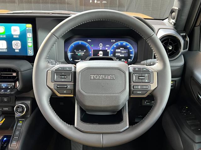 ランドクルーザー２５０ ＺＸファーストエディション　【ファーストエディション】　内装ブラウン　丸目ヘッドライト　１２．３インチＪＢＬコネクトナビ　チームメイト　　デジタルインナーミラー　サンルーフ　電動デフロック　置き充電　シートメモリー　純正１８ＡＷ（49枚目）