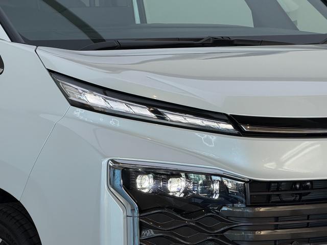 ヴォクシー ハイブリッドＳ－Ｚ　【改モデル】　１０．５インチコネクトナビ　３眼ＬＥＤヘッドライト　ユニバーサルスッテプ　トヨタチームメイト　快適利便パッケージＨＩ　ＰＶＭ　ＢＳＭ　ヘッドアップディスプレイ　寒冷地　純正インチ１７ＡＷ（19枚目）