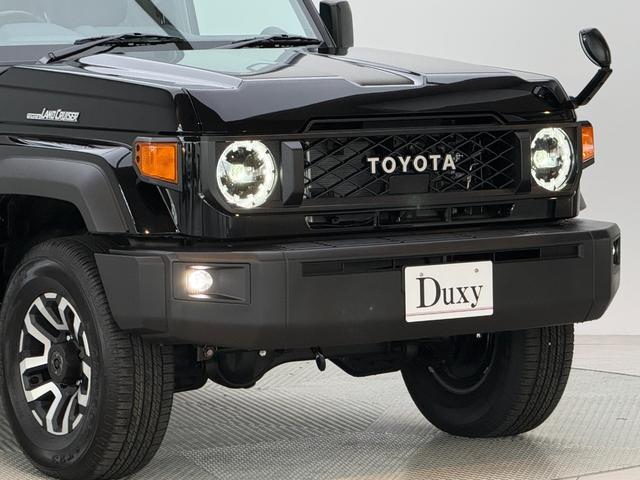 ランドクルーザー７０ ＡＸ　【内装ブラック】　丸目ヘッドライト　バックモニター内臓インナーミラー　電動デフロック　　背面タイヤ　リモコンキー　　ヒルスタートアシストコントロール　ダウンヒルスタートコントロール　純正１６インチＡＷ（18枚目）