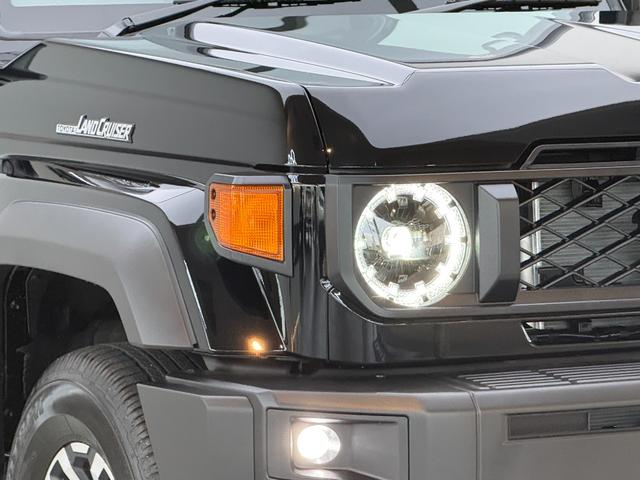 ランドクルーザー７０ ＡＸ　【内装ブラック】　丸目ヘッドライト　バックモニター内臓インナーミラー　電動デフロック　　背面タイヤ　リモコンキー　　ヒルスタートアシストコントロール　ダウンヒルスタートコントロール　純正１６インチＡＷ（19枚目）