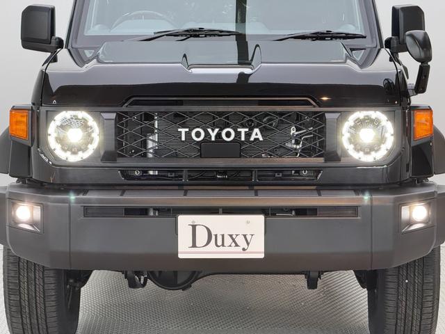 ランドクルーザー７０ ＡＸ　【内装ブラック】　丸目ヘッドライト　バックモニター内臓インナーミラー　電動デフロック　　背面タイヤ　リモコンキー　　ヒルスタートアシストコントロール　ダウンヒルスタートコントロール　純正１６インチＡＷ（26枚目）