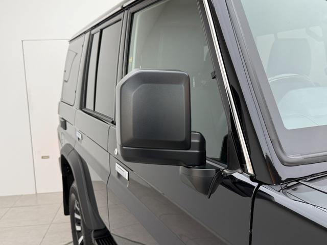 ランドクルーザー７０ ＡＸ　【内装ブラック】　丸目ヘッドライト　バックモニター内臓インナーミラー　電動デフロック　　背面タイヤ　リモコンキー　　ヒルスタートアシストコントロール　ダウンヒルスタートコントロール　純正１６インチＡＷ（27枚目）