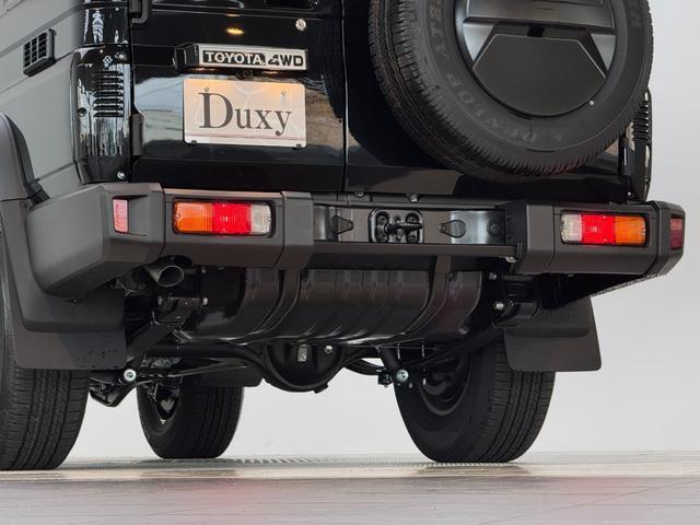 ランドクルーザー７０ ＡＸ　【内装ブラック】　丸目ヘッドライト　バックモニター内臓インナーミラー　電動デフロック　　背面タイヤ　リモコンキー　　ヒルスタートアシストコントロール　ダウンヒルスタートコントロール　純正１６インチＡＷ（34枚目）