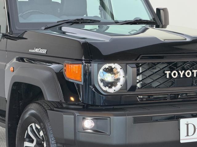 ランドクルーザー70 AX 【純正ナビ付き】 丸目ヘッドライト バックモニター内臓インナーミラー 電動デフロック 背面タイヤ リモコンキー ヒルスタートアシストコントロール ダウンヒルスタートコントロール 純正16インチAW(19枚目)