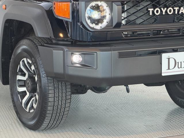 ランドクルーザー70 AX 【純正ナビ付き】 丸目ヘッドライト バックモニター内臓インナーミラー 電動デフロック 背面タイヤ リモコンキー ヒルスタートアシストコントロール ダウンヒルスタートコントロール 純正16インチAW(21枚目)