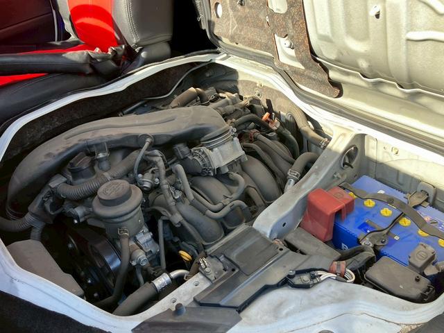 レジアスエースバン ロングスーパーＧＬ　フルフラットベットキッド　フロントエアロ　赤×黒ツートンレザー調シートカバー　ケンウッドナビ　フルセグＴＶ　Ｂｌｕｅｔｏｏｔｈ接続　社外ヘッドライト・テールライト　ＡＵＴＯライト　ＥＴＣ（20枚目）