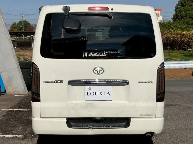 レジアスエースバン ロングスーパーＧＬ　フルフラットベットキッド　フロントエアロ　赤×黒ツートンレザー調シートカバー　ケンウッドナビ　フルセグＴＶ　Ｂｌｕｅｔｏｏｔｈ接続　社外ヘッドライト・テールライト　ＡＵＴＯライト　ＥＴＣ（75枚目）