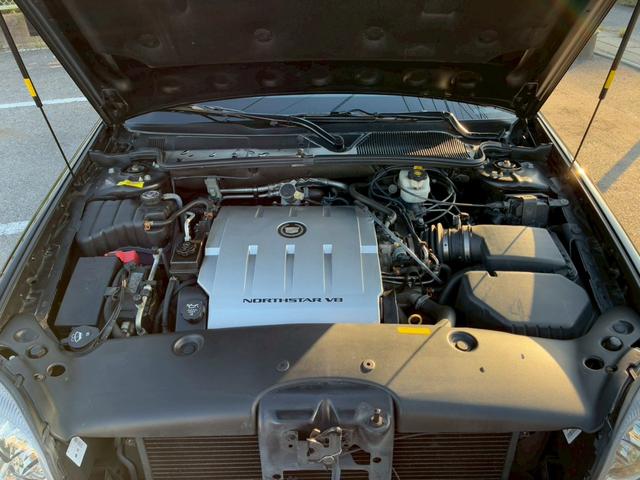 キャデラックドゥビル ＤＨＳ　最終モデル　正規ディーラー車　禁煙車　カロッツェリアナビ　フルセグＴＶ　黒革シート　シートヒーター　シートクーラー　クルーズコントロール　ステアリングヒーター　Ｂｌｕｅｔｏｏｔｈオーディオ　ＥＴＣ（66枚目）