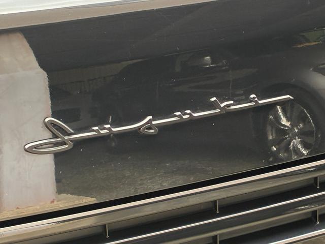 エブリイ ジョインターボ　禁煙　ナビ　バックモニター　ルーフキャリア　筆記体レトロ調エンブレム　ＭＡＤＣＲＯＳＳ／ＧＲＡＣＥ１４インチＡＷ　ジオランダーＸ－ＡＴ　ベッドキット　黒革調シートカバー　Ｂｌｕｅｔｏｏｔｈオーディオ（6枚目）