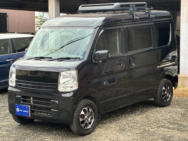 エブリイ ジョインターボ　禁煙　ナビ　バックモニター　ルーフキャリア　筆記体レトロ調エンブレム　ＭＡＤＣＲＯＳＳ／ＧＲＡＣＥ１４インチＡＷ　ジオランダーＸ－ＡＴ　ベッドキット　黒革調シートカバー　Ｂｌｕｅｔｏｏｔｈオーディオ（15枚目）