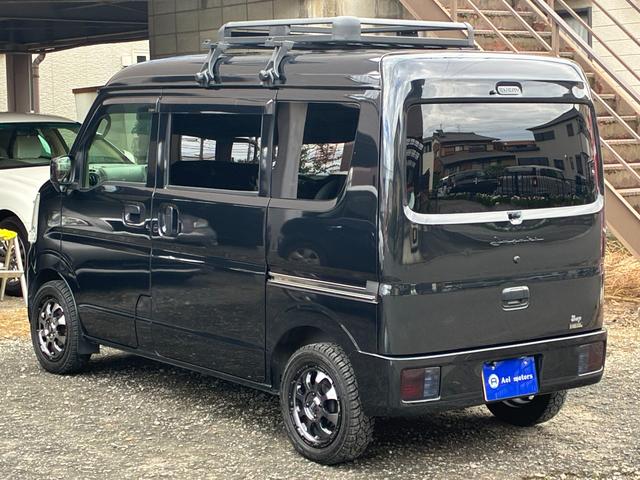 エブリイ ジョインターボ　禁煙　ナビ　バックモニター　ルーフキャリア　筆記体レトロ調エンブレム　ＭＡＤＣＲＯＳＳ／ＧＲＡＣＥ１４インチＡＷ　ジオランダーＸ－ＡＴ　ベッドキット　黒革調シートカバー　Ｂｌｕｅｔｏｏｔｈオーディオ（20枚目）