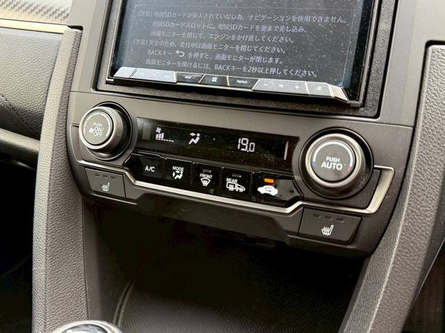 シビック ハッチバック　ホンダセンシング　モデューロ１８インチＡＷ　純正エアロパーツ　オレンジアクセントエクステリアパネル　カロッツェリア　バックカメラ　純正ドライブレコーダー　ビルトインＥＴＣ　　ステンレス製スポーツペダル　　オートクルーズ（49枚目）
