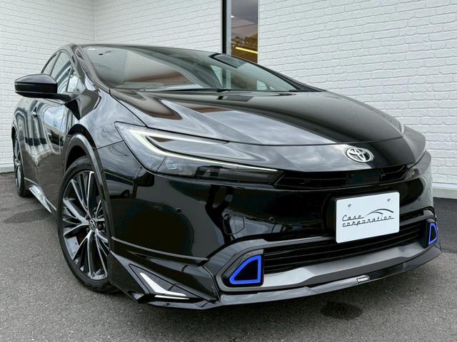 プリウス Z モデリスタエアロ シグネチャーイルミ パノラマルーフ デジタルインナーミラー スペアタイヤ パノラミックビュー ブラインドスポット ステアリングヒーター シートヒーター/クーラー パワーバックドア(8枚目)