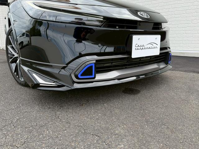 プリウス Z モデリスタエアロ シグネチャーイルミ パノラマルーフ デジタルインナーミラー スペアタイヤ パノラミックビュー ブラインドスポット ステアリングヒーター シートヒーター/クーラー パワーバックドア(10枚目)