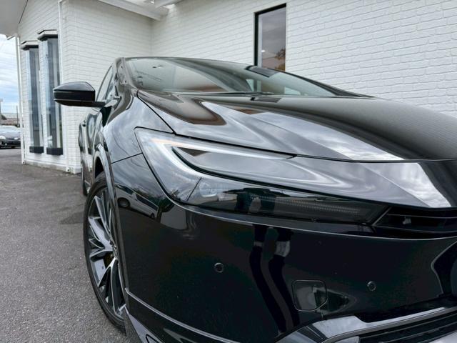 プリウス Z モデリスタエアロ シグネチャーイルミ パノラマルーフ デジタルインナーミラー スペアタイヤ パノラミックビュー ブラインドスポット ステアリングヒーター シートヒーター/クーラー パワーバックドア(14枚目)