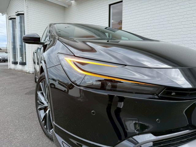 プリウス Z モデリスタエアロ シグネチャーイルミ パノラマルーフ デジタルインナーミラー スペアタイヤ パノラミックビュー ブラインドスポット ステアリングヒーター シートヒーター/クーラー パワーバックドア(15枚目)