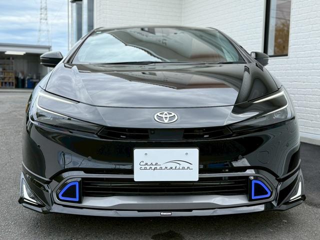プリウス Z モデリスタエアロ シグネチャーイルミ パノラマルーフ デジタルインナーミラー スペアタイヤ パノラミックビュー ブラインドスポット ステアリングヒーター シートヒーター/クーラー パワーバックドア(19枚目)