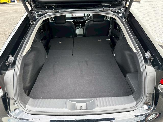 プリウス Z モデリスタエアロ シグネチャーイルミ パノラマルーフ デジタルインナーミラー スペアタイヤ パノラミックビュー ブラインドスポット ステアリングヒーター シートヒーター/クーラー パワーバックドア(77枚目)