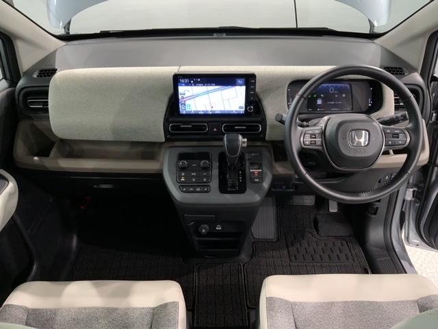 フリード エアーＥＸ　禁煙試乗車　新車保証　ワンオ－ナ－　ナビＬＸＭ－２４２ＺＦＮｉ　フルセグ　Ｒカメラ　ＢＴａｕｄｉｏ　ＥＴＣ　ＬＥＤライト　両側電動ドア　シ－トヒ－タ－　クルコン　Ｒクーラー　アルミ（9枚目）