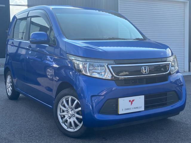 Ｎ－ＷＧＮ Ｇ・スタイリッシュパッケージ　ワンオーナー車　純正７インチエントリーナビ　ＣＤ　バックモニター　ＨＩＤヘッドライト　ハーフレザーシート　純正１４インチナビ　プッシュスタート　クルーズコントロール　スマートキー（10枚目）