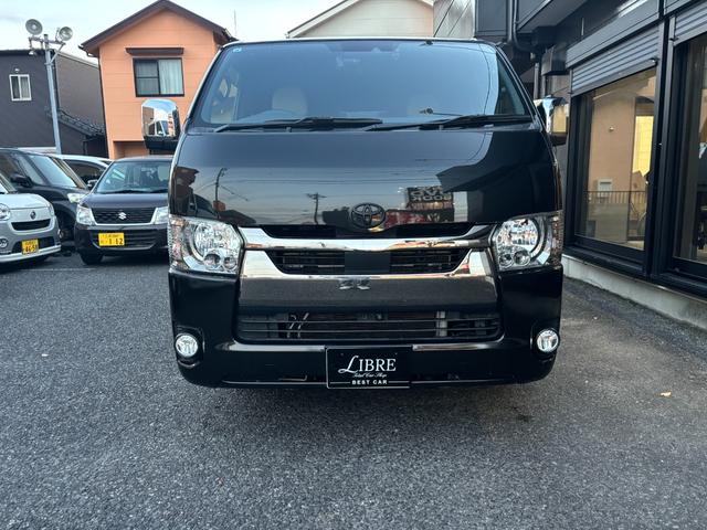 ハイエースバン スーパーGL ダークプライムII パナソニック10インチナビ、パノラミックビューモニター、両側パワースライドドア、レーンキープアシスト、デジタルインナーミラー、ETC、AC100V電源、LEDヘッドライト、リアエアコン、フルセグTV(3枚目)