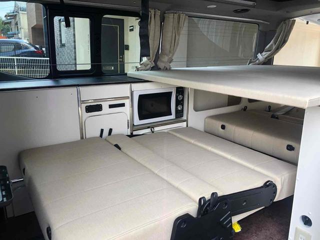 ＮＶ３５０キャラバンバン 　キャンピングカーバンテックＤｉａｒｉｏＰｏｐ　スライドドア　ベッド２段　キッチン　シンク　電子レンジ　２０００Ｗインバーター　ソラーパネル　パナソニックＣＮ－Ｒ３３０ナビＴＶ（4枚目）