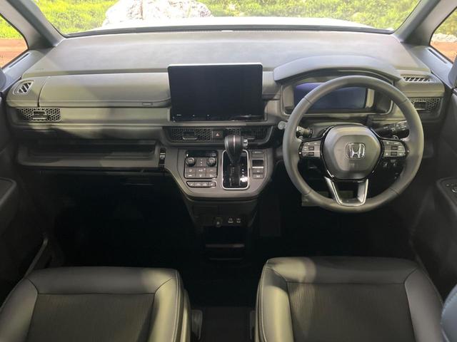 ステップワゴン スパーダ　登録済未使用車　純正１１型ナビ　両側電動ドア　バックカメラ　１００Ｖ電源　ハーフレザーシート　コーナーセンサー　スマートキー　ＬＥＤヘッド　純正１６インチアルミ　車線逸脱警報　オートライト（2枚目）