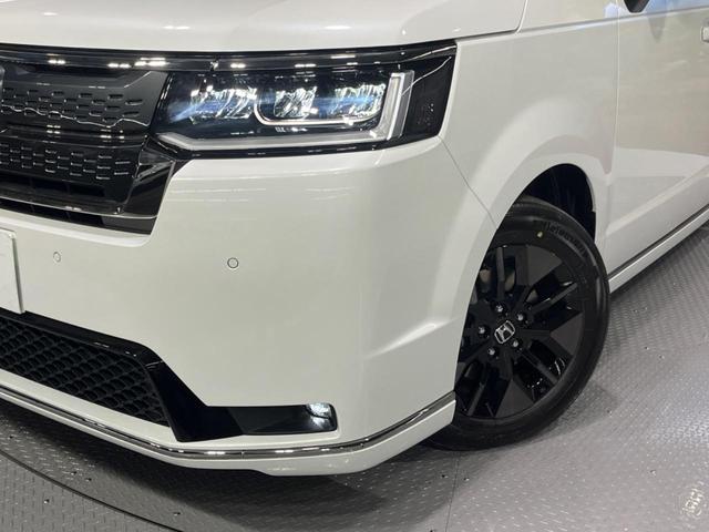 ステップワゴン スパーダ　登録済未使用車　純正１１型ナビ　両側電動ドア　バックカメラ　１００Ｖ電源　ハーフレザーシート　コーナーセンサー　スマートキー　ＬＥＤヘッド　純正１６インチアルミ　車線逸脱警報　オートライト（12枚目）