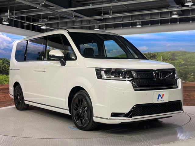 ステップワゴン スパーダ　登録済未使用車　純正１１型ナビ　両側電動ドア　バックカメラ　１００Ｖ電源　ハーフレザーシート　コーナーセンサー　スマートキー　ＬＥＤヘッド　純正１６インチアルミ　車線逸脱警報　オートライト（17枚目）