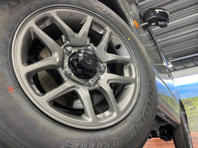 ジムニー ＸＣ　届出済未使用車　衝突軽減　クルコン　スマートキー　クリアランスソナー　純正ＡＷ　革巻きステアリング　車線逸脱防止　ヘッドライトウォッシャー　ドアミラーヒーター　ステアリングスイッチ（11枚目）