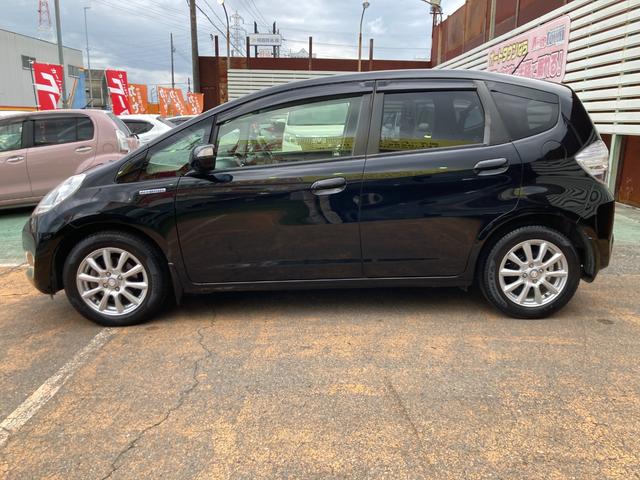 フィットハイブリッド スマートセレクション 後期モデル/車検2年+整備&保守付き/純正メモリーナビ(TV/CD/DVD/SD/USB)/バックカメラ/ETC/オートクルーズコントロール/HID(オートライト)/スマートキー/社外15インチアルミ(27枚目)