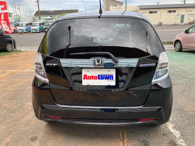 フィットハイブリッド スマートセレクション 後期モデル/車検2年+整備&保守付き/純正メモリーナビ(TV/CD/DVD/SD/USB)/バックカメラ/ETC/オートクルーズコントロール/HID(オートライト)/スマートキー/社外15インチアルミ(29枚目)