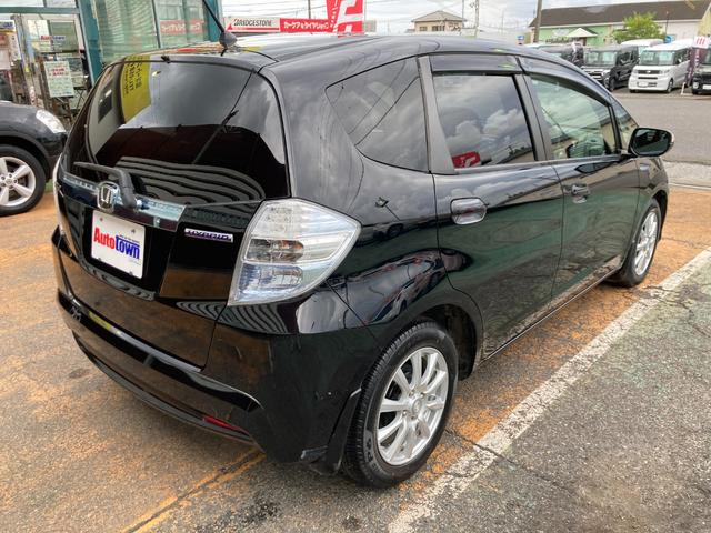 フィットハイブリッド スマートセレクション 後期モデル/車検2年+整備&保守付き/純正メモリーナビ(TV/CD/DVD/SD/USB)/バックカメラ/ETC/オートクルーズコントロール/HID(オートライト)/スマートキー/社外15インチアルミ(30枚目)